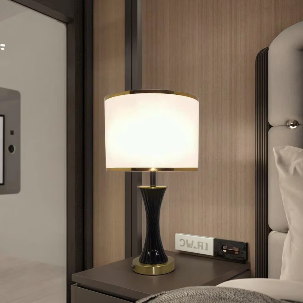 Elegant Fusion: Black Ceramic and Metal Table Lamp with White Fabric Shade