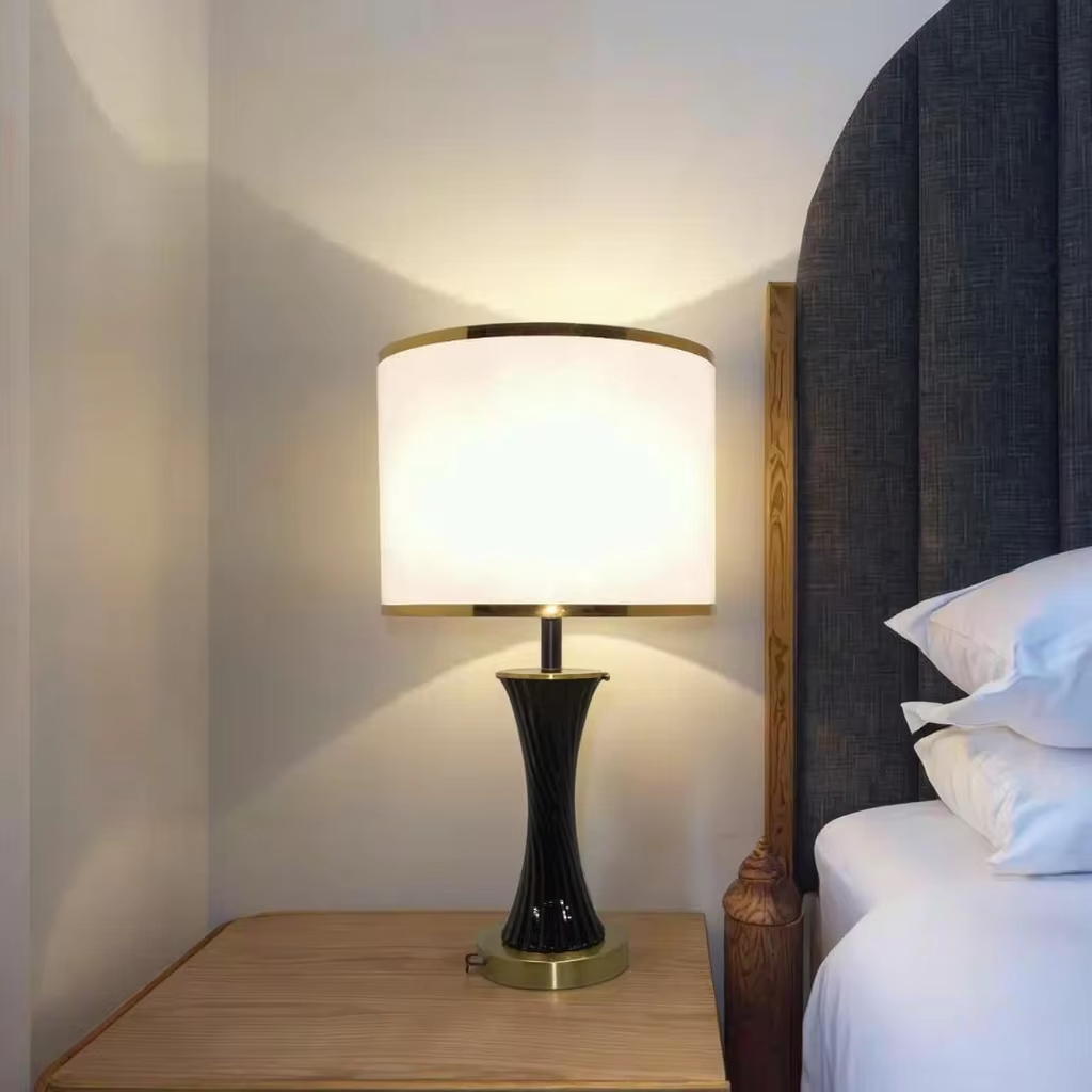 Elegant Fusion: Black Ceramic and Metal Table Lamp with White Fabric Shade