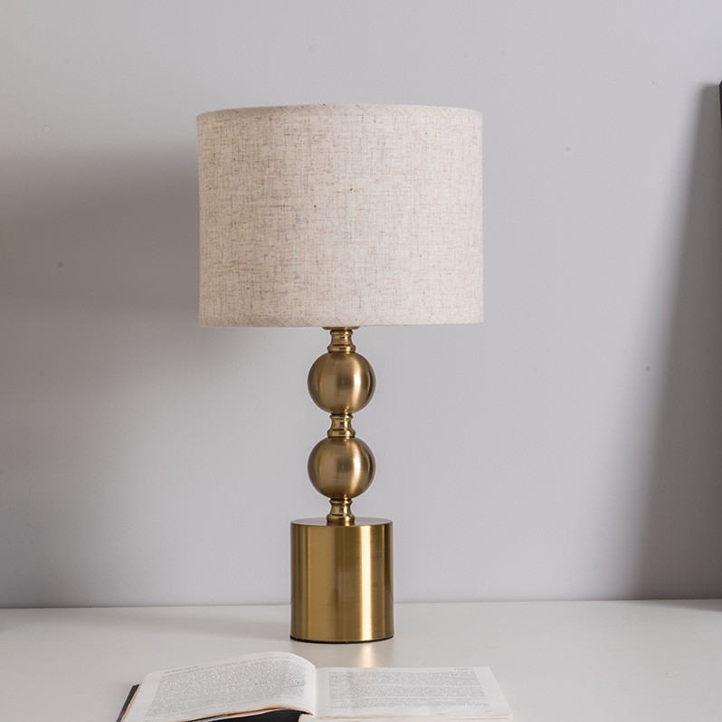 Elevate Spaces with Brass - Based Linen - Shade Table Lamp: Timeless Charm & Warm Illumination