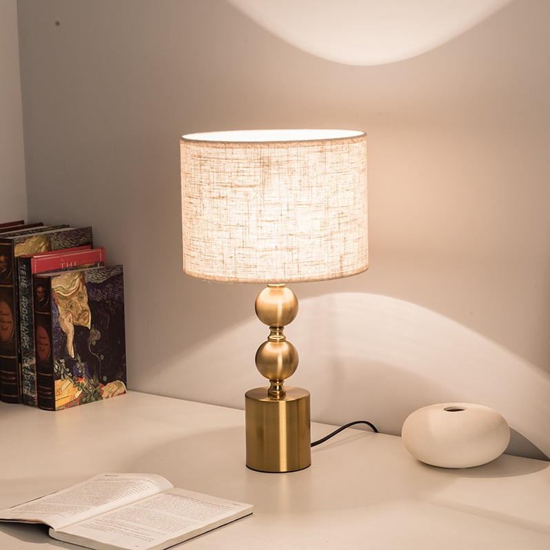 Elevate Spaces with Brass - Based Linen - Shade Table Lamp: Timeless Charm & Warm Illumination