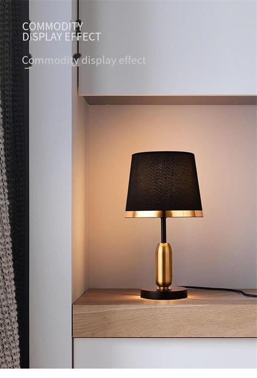 Stylish Gold Metal Table Lamp with Black/White Fabric Shade