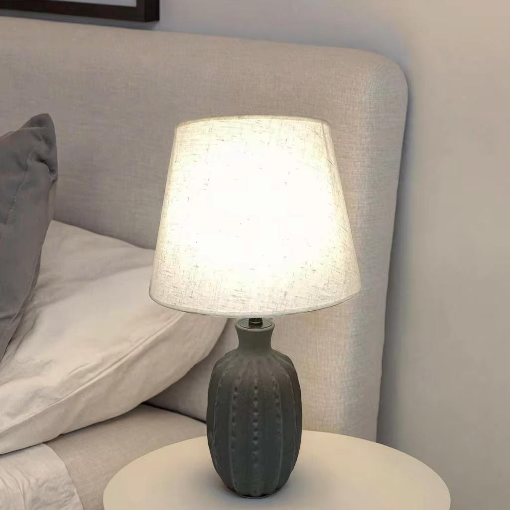 Black and White Fusion: The Elegance of a Black Ceramic and White Linen Table Lamp