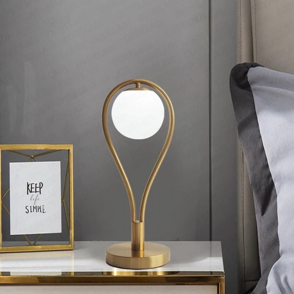 Gold - Toned Table Lamp with Milk - White Glass Shade: A Fusion of Elegance and Function