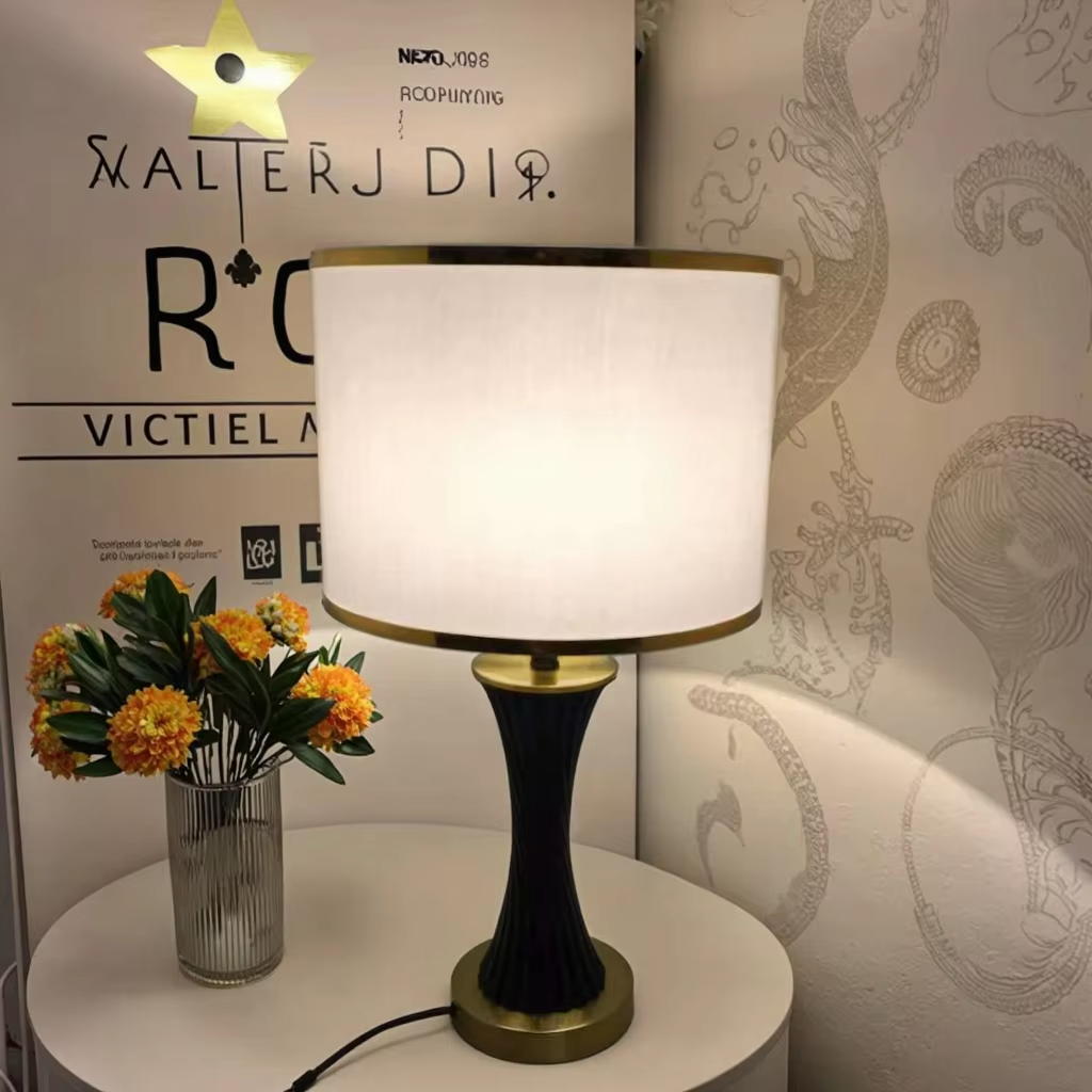 Elegant Fusion: Black Ceramic and Metal Table Lamp with White Fabric Shade