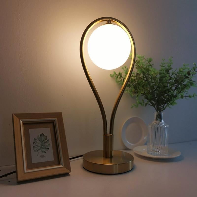 Gold - Toned Table Lamp with Milk - White Glass Shade: A Fusion of Elegance and Function
