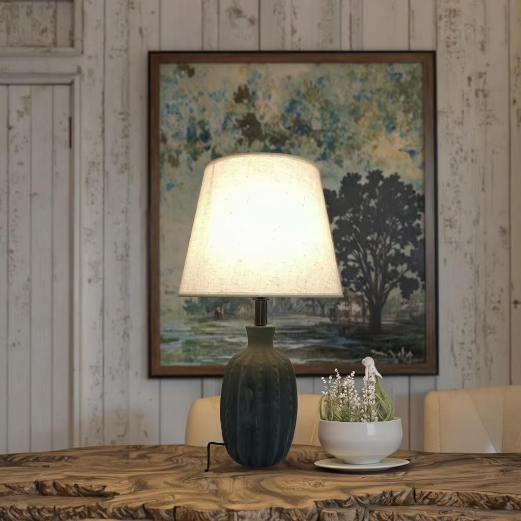 Black and White Fusion: The Elegance of a Black Ceramic and White Linen Table Lamp