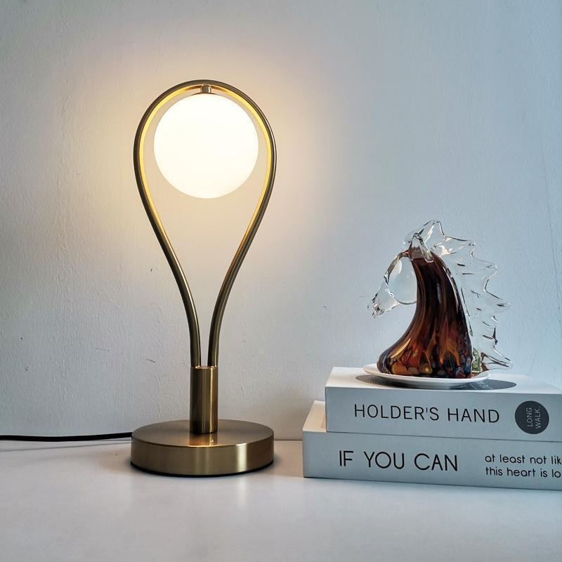 Gold - Toned Table Lamp with Milk - White Glass Shade: A Fusion of Elegance and Function