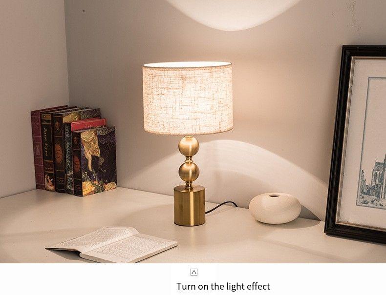 Elevate Spaces with Brass - Based Linen - Shade Table Lamp: Timeless Charm & Warm Illumination