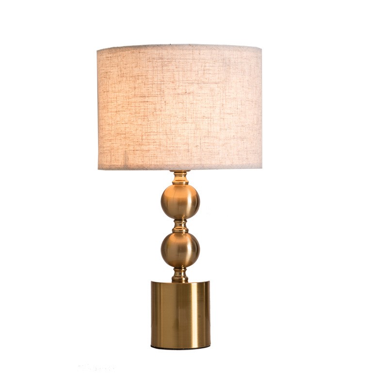 Elevate Spaces with Brass - Based Linen - Shade Table Lamp: Timeless Charm & Warm Illumination