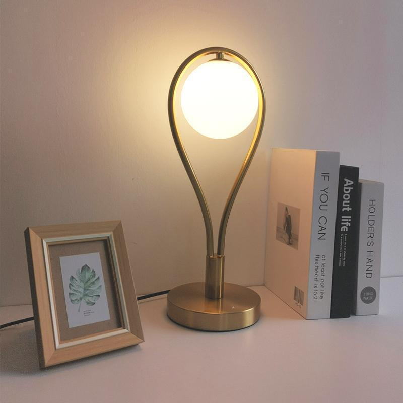 Gold - Toned Table Lamp with Milk - White Glass Shade: A Fusion of Elegance and Function