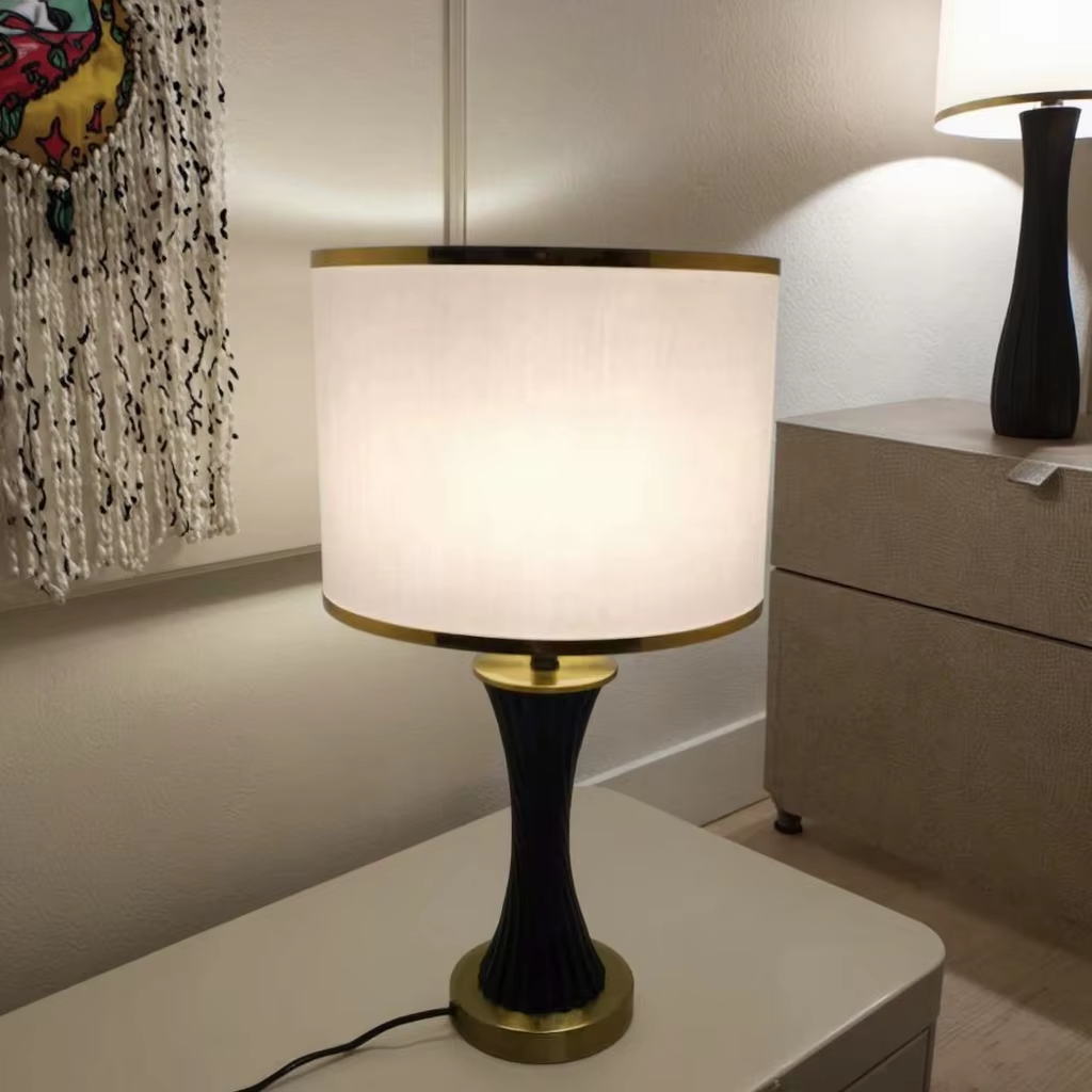 Elegant Fusion: Black Ceramic and Metal Table Lamp with White Fabric Shade