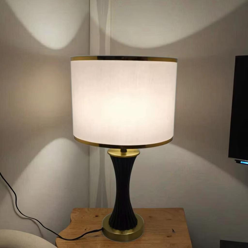 Elegant Fusion: Black Ceramic and Metal Table Lamp with White Fabric Shade