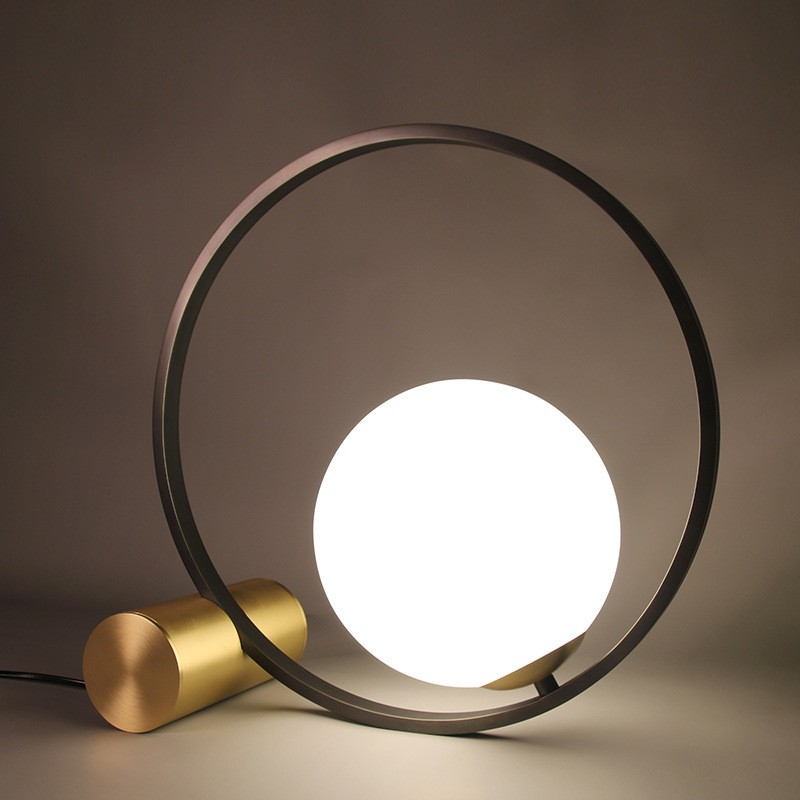 Modern Sculptural Table Lamp: Milk Glass Globe & Metal Frame Fusion for Art-Infused Spaces
