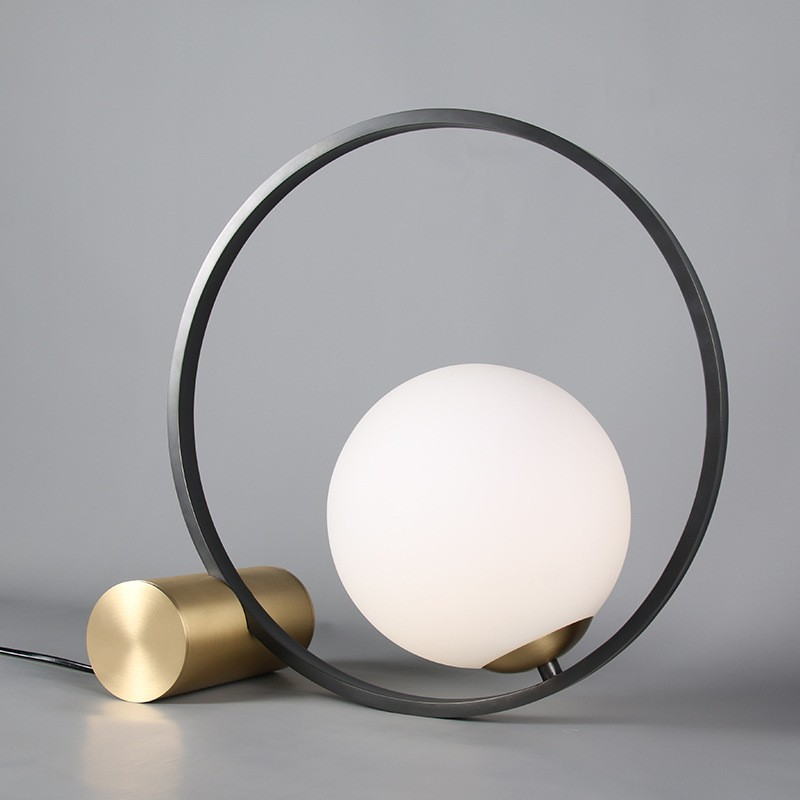 Modern Sculptural Table Lamp: Milk Glass Globe & Metal Frame Fusion for Art-Infused Spaces