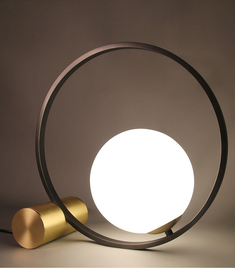 Modern Sculptural Table Lamp: Milk Glass Globe & Metal Frame Fusion for Art-Infused Spaces